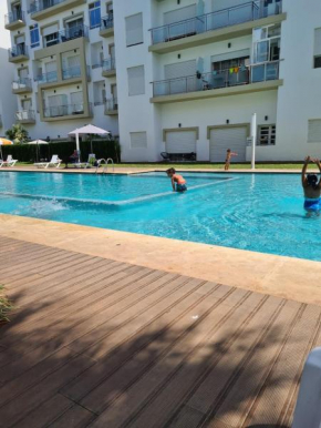 Appartement résidence kettani jardin privatif accès direct piscine et aire de jeu